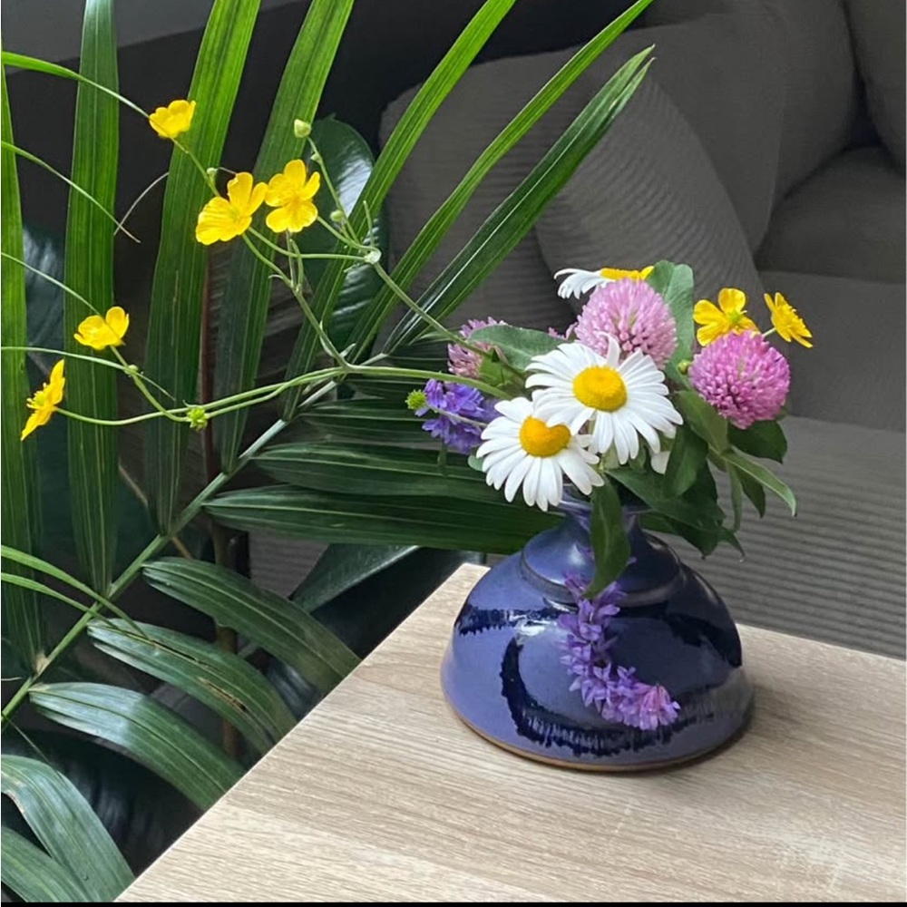 Floral Ceramic Vase with Blue shiny polish  Design touches on it